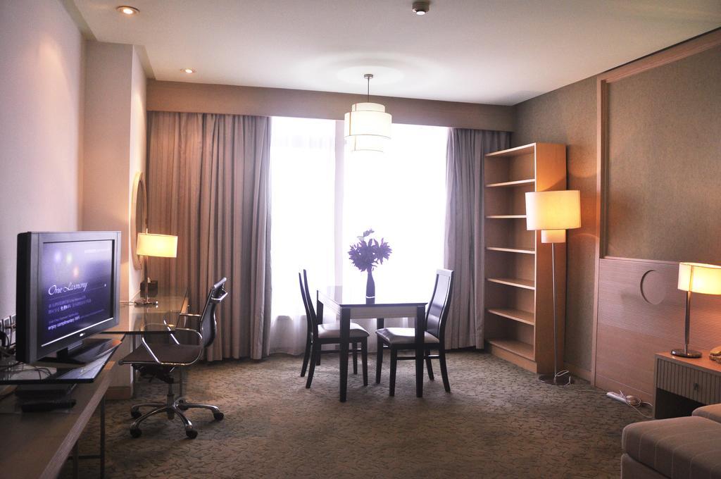 Hotel Nikko Tianjin Luaran gambar A suite at the hotel