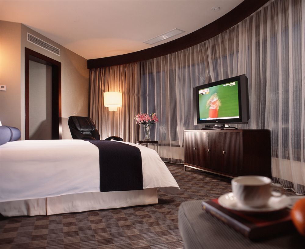 Hotel Nikko Tianjin Luaran gambar A suite at the hotel